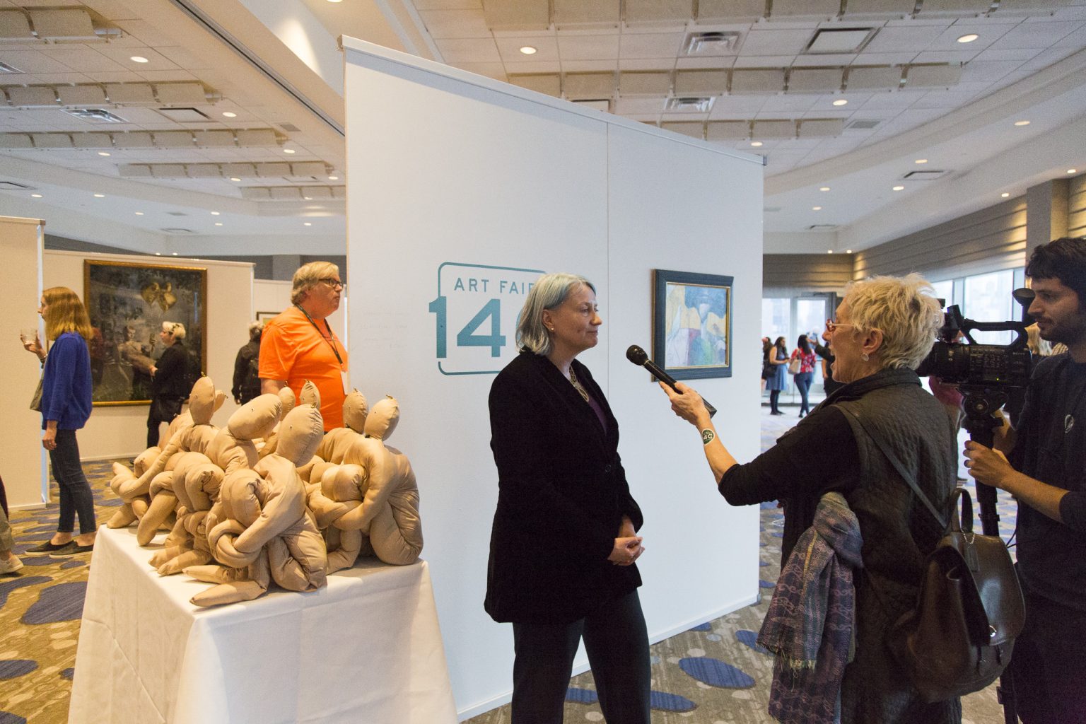Art Fair 14C founder Robinson Holloway being interviewed in the Showcase area during the 2019 1st Edition of the fair